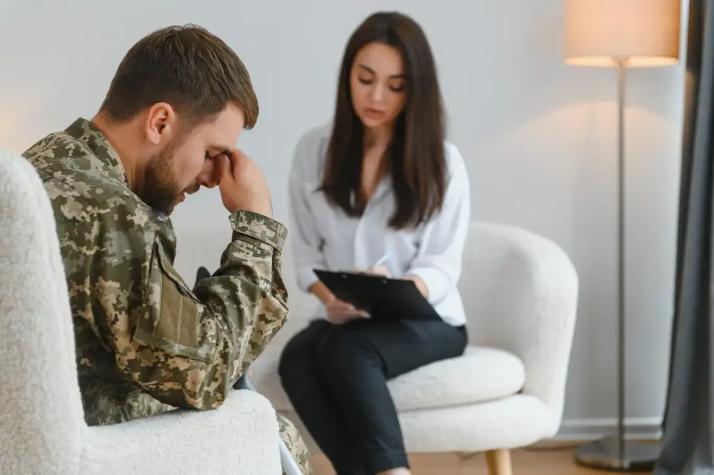 Army anger, ptsd and man in therapy with stress from war and a psychologist for support